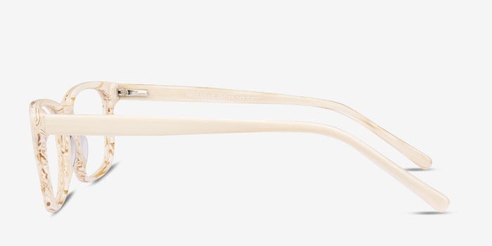 cream colored eyeglass frames