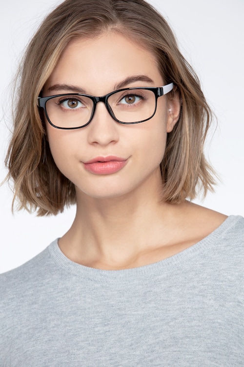 black and white plastic eyeglass frames