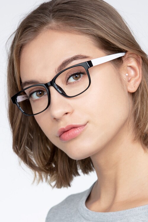 black and white plastic eyeglass frames