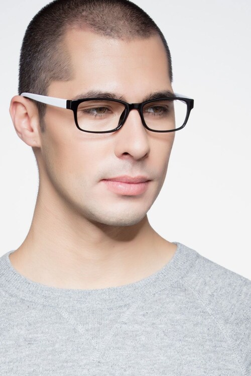 black and white plastic eyeglass frames