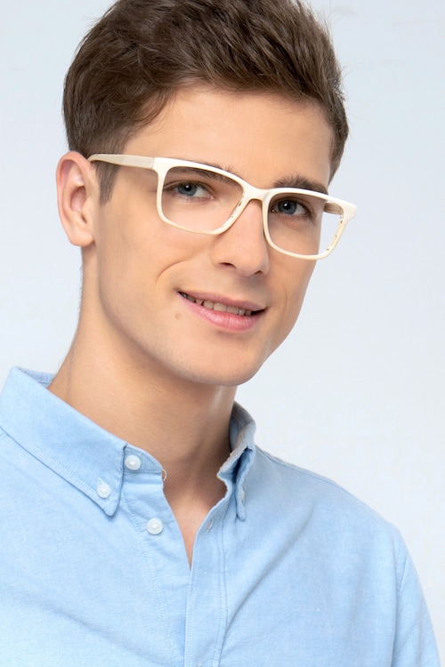 cream colored eyeglass frames